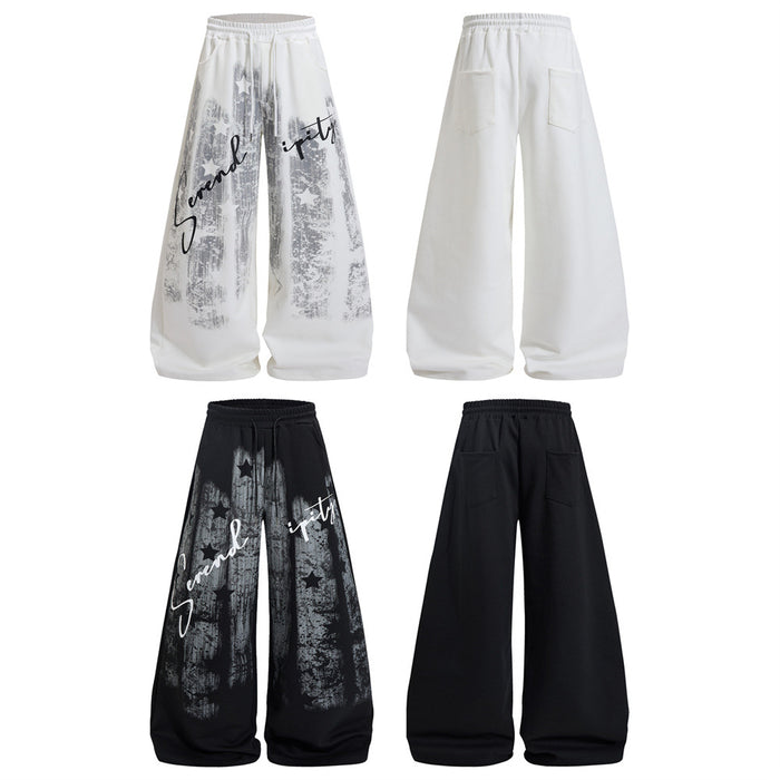 White and black wide-leg sweatpants shown in front and back views, featuring graphic and plain sides