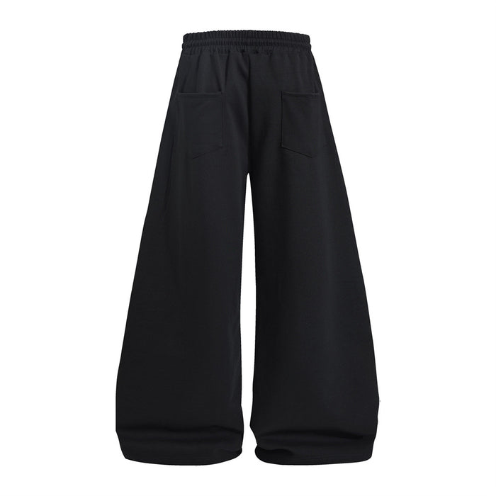 Black wide-leg sweatpants shown from the back with two stitched rear pockets and plain fabric