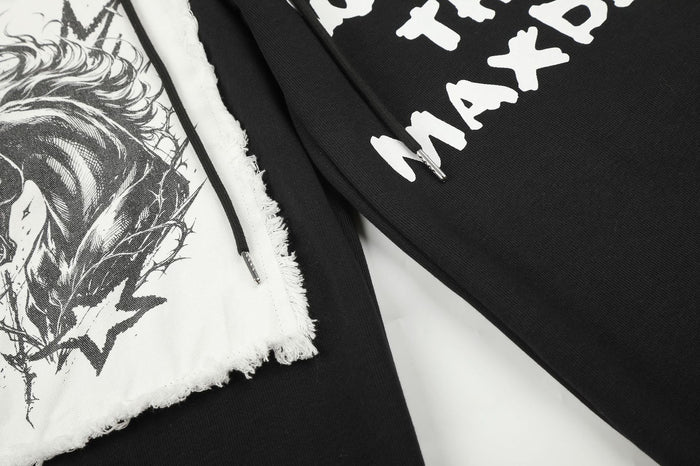 Close-up of the frayed animal patch, black drawstring, and partial white graffiti lettering