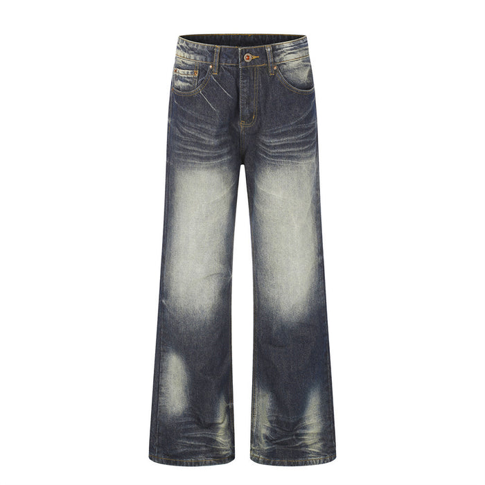 Full front view of dark blue wide-leg denim jeans with faded thighs, whiskering, and distressed wash