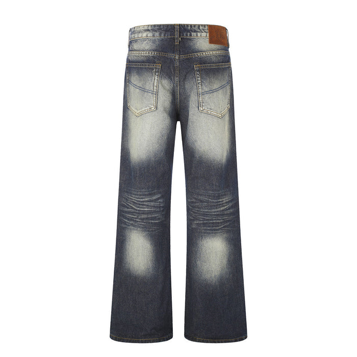 Full back view of dark blue wide-leg jeans with two patch pockets, faded seat, and horizontal knee whiskering