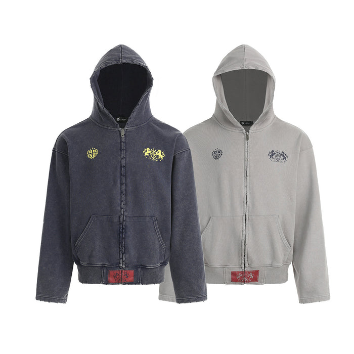 Two cropped zip-up hoodies in dark charcoal and light gray with chest crest graphics and front pockets
