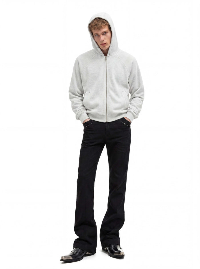 Light gray cropped full-zip hoodie worn with the hood up in a full-body front view