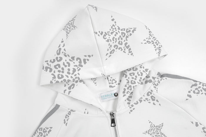 Close-up of the white hoodie hood and front zipper with gray leopard-pattern star print