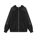 Oversized black zip-up hoodie with rhinestone scatter embellishment on shoulder panels and decorative silver star zipper pull