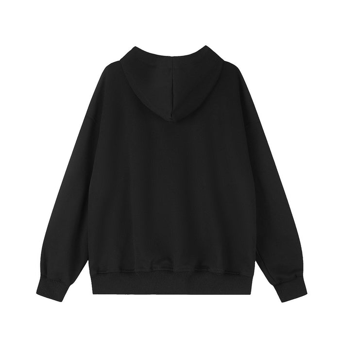 Back view of an oversized black hoodie with a hood, long sleeves, ribbed cuffs, and ribbed hem