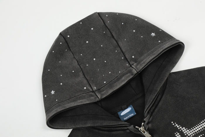 Close-up of the black hood showing scattered rhinestone accents, stitched panels, and the inner lining